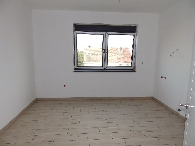 Widok na jedną z trzech sypialni w mieszkaniu A1239.