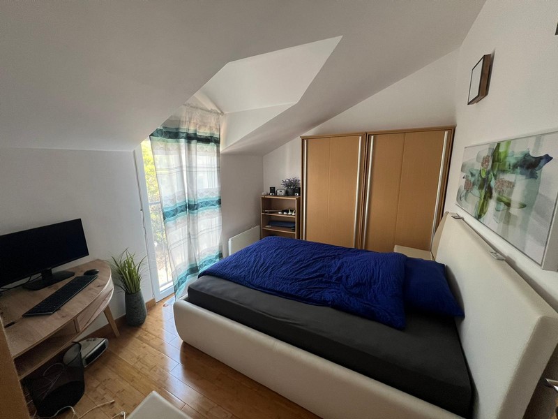Sypialnia w apartamencie A2803 w Tisno w Chorwacji.