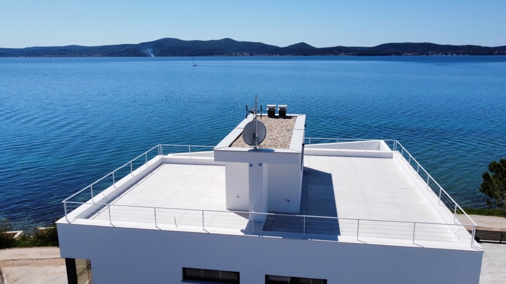 Nieruchomości z tarasem na dachu tuż nad morzem - Panorama Scouting A2898.