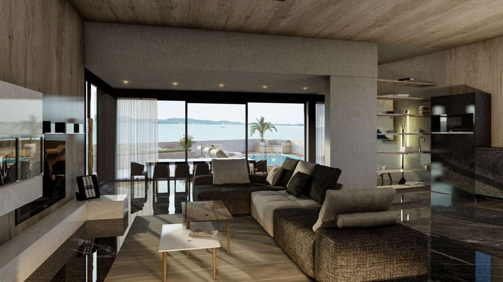 Przestronny taras z widokiem na basen i morze