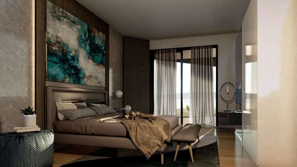 Sypialnia z wyjściem na taras i widokiem na morze