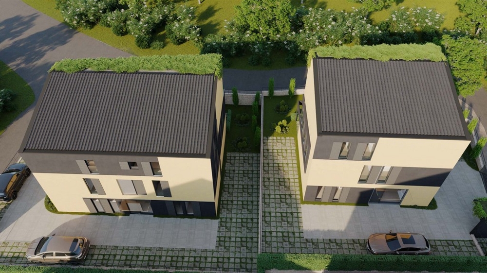 Nieruchomości w Chorwacji, widok z lotu ptaka na dwa nowoczesne apartamenty na sprzedaż na wyspie Krk z otaczającymi ogrodami