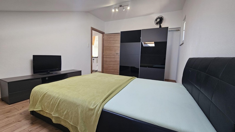 Druga przytulna sypialnia.