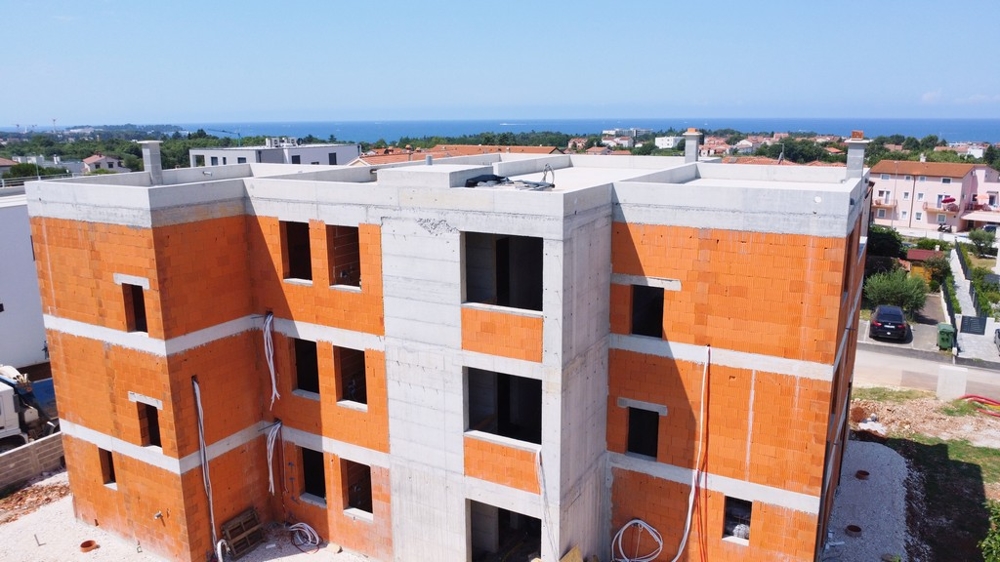 Nowy budynek z widokiem na morze na sprzedaż w Porec na Istrii - Panorama Scouting.