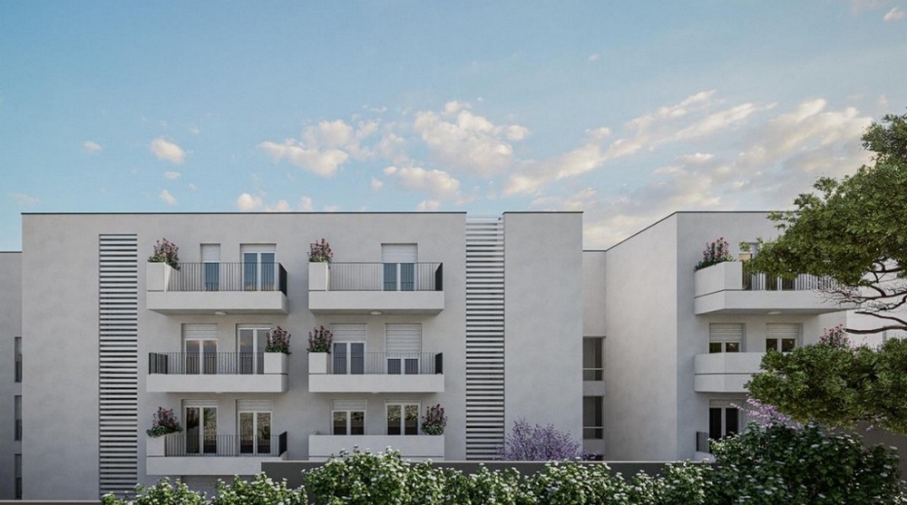 Tył nowego budynku z balkonami