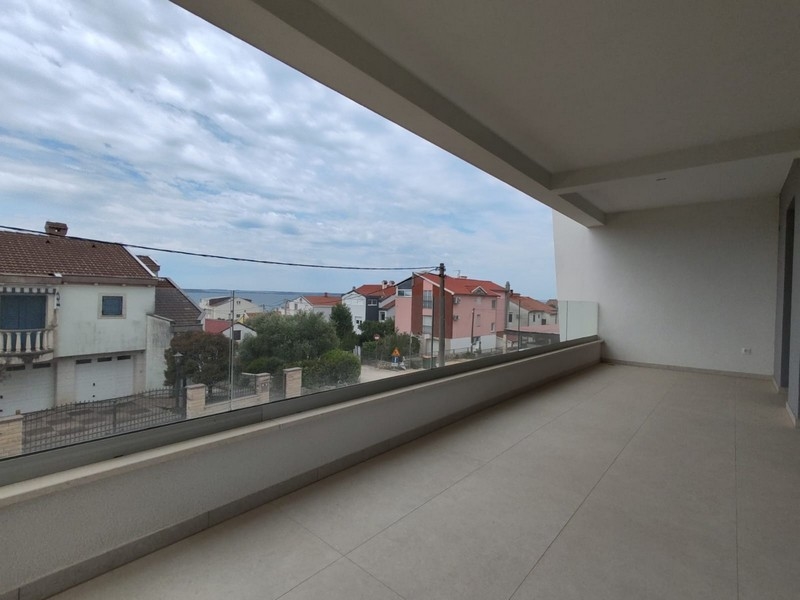 Widok na morze z balkonu nieruchomości A3671 w Chorwacji.