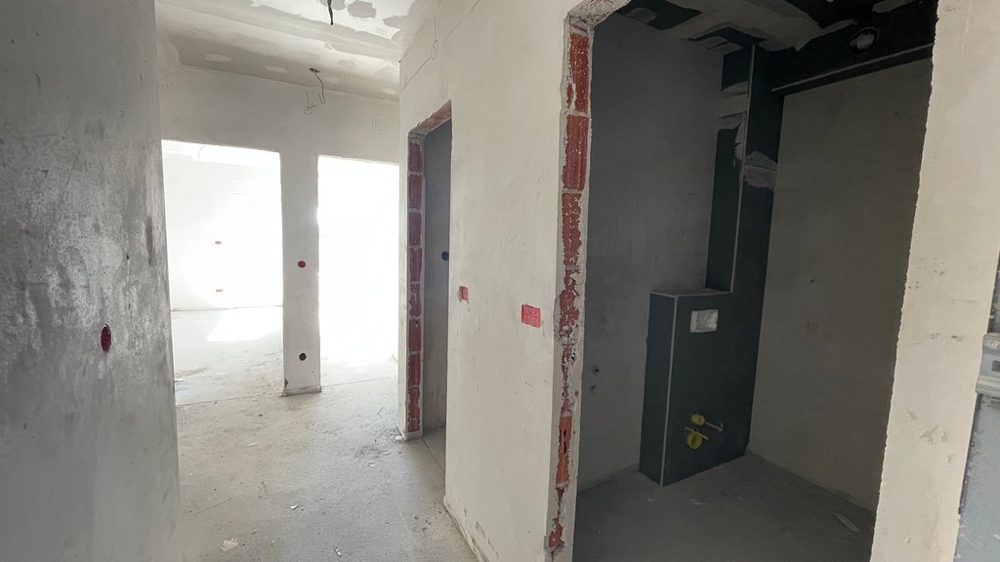 Przedpokój z dostępem do łazienki i części dziennej