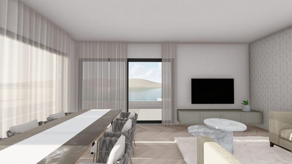 Nowoczesny salon i jadalnia z bezpośrednim dostępem do tarasu i widokiem na morze
