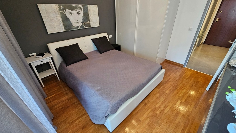 Sypialnia w apartamencie z widokiem na morze Novigrad