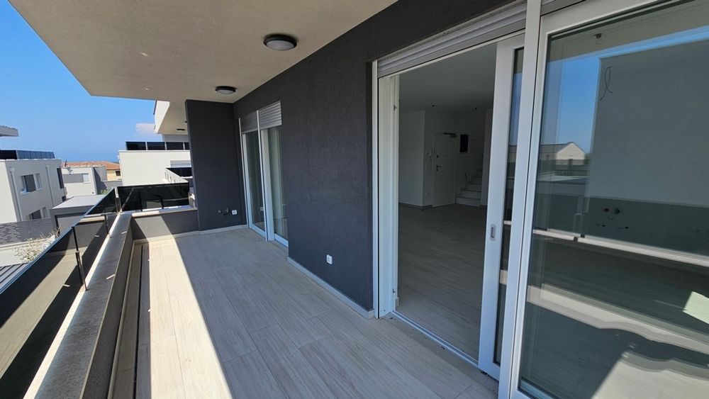 Taras z widokiem na morze w penthousie