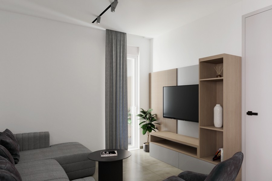 Salon z drewnianą ścianą pod telewizor i regałem