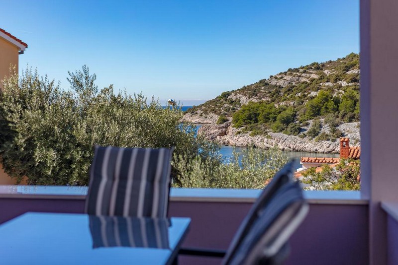 Widok na morze z tarasu apartamentu w Willi H1569 w Chorwacji - Panorama Harcerska.