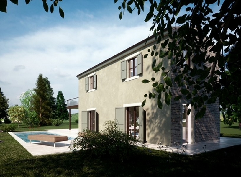 Widok na nieruchomość na Istrii z widokiem na morze, otoczoną czerwonymi liśćmi i czystym niebem.