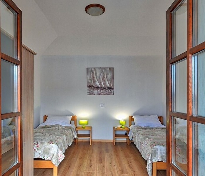 Na tym zdjęciu widać atrakcyjną i wygodną sypialnię nieruchomości H2361, która jest na sprzedaż w Ugljan / Pasman / Dugi Otok.