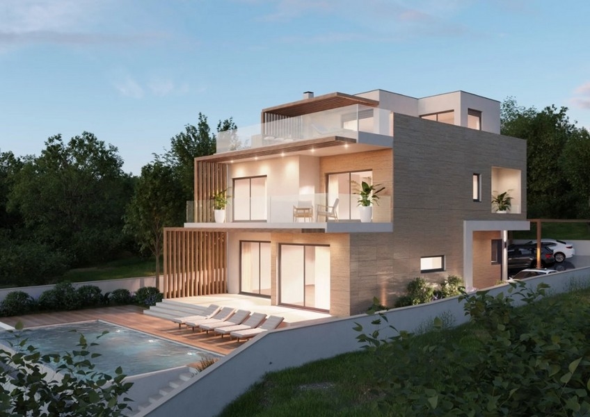 Widok z lotu ptaka na nowoczesną nieruchomość w Chorwacji, willę z widokiem na morze w nocy