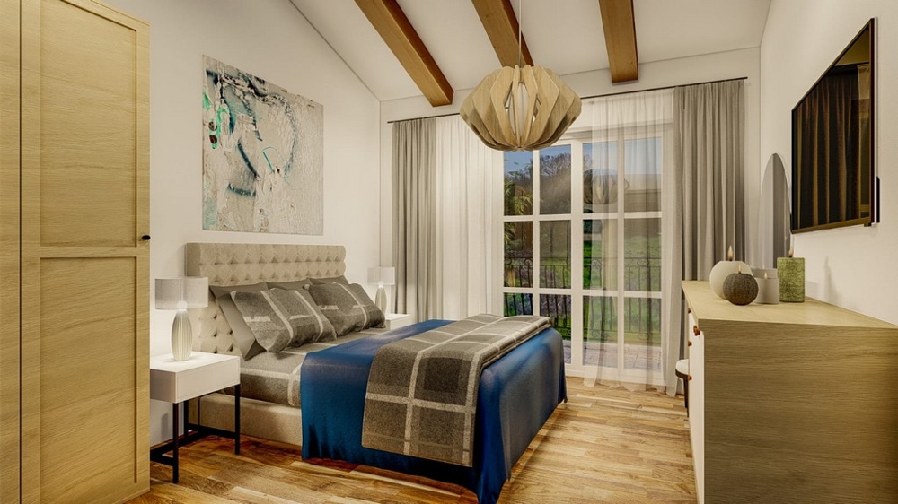 Sypialnia z dużym podwójnym łóżkiem, sufitem w paski w kolorze niebieskim i szarym, drewnianymi podłogami i dużymi oknami z widokiem na wiejską okolicę.