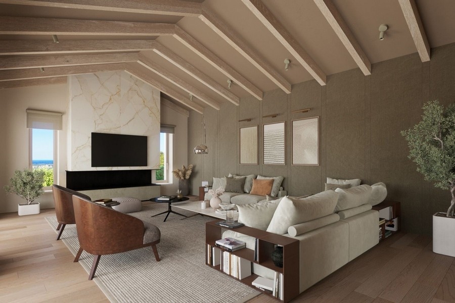 Stylowa część dzienna z kominkiem i widokiem na morze