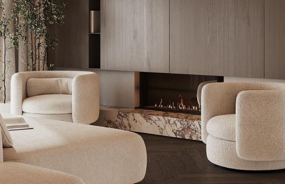 Elegancki salon z kominkiem i wygodnymi fotelami