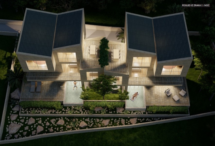 Iluminowana nocna wizualizacja willi z lotu ptaka z basenami