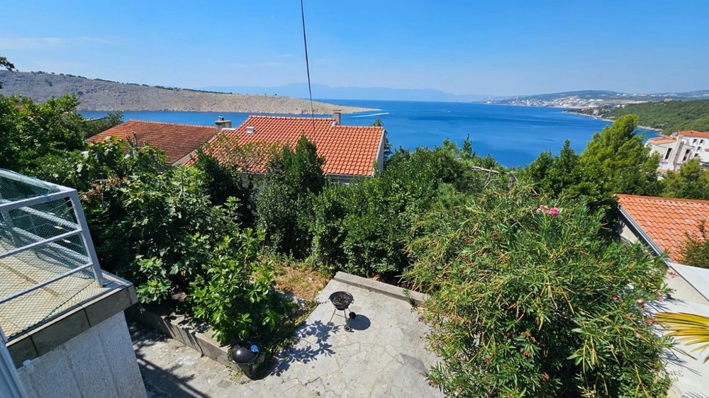 Taras z widokiem na morze i ogród