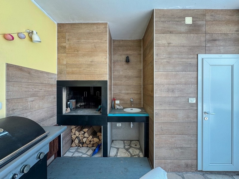 Zadaszone miejsce do grillowania ze zlewem