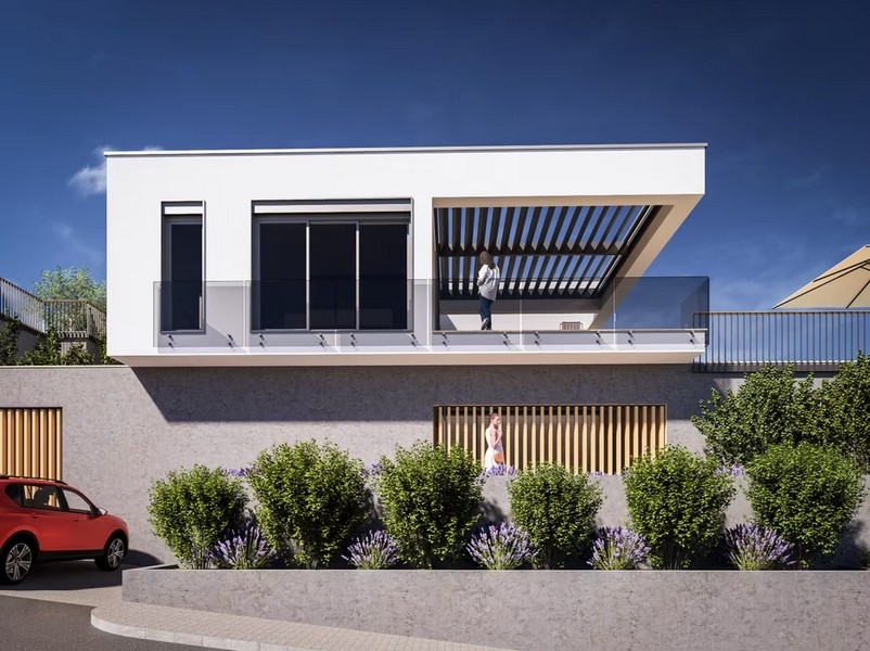 Nowy budynek z tarasem i szklanymi balustradami