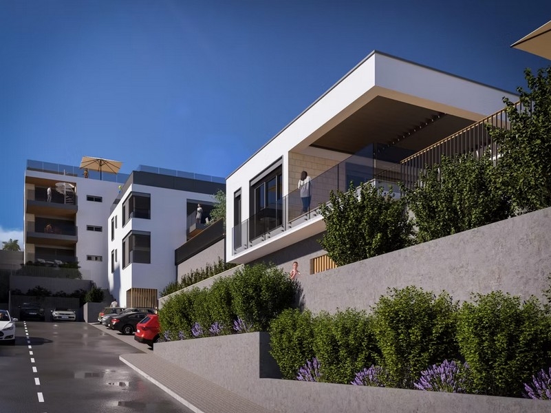 Zespół mieszkaniowy z nowoczesną zabudową na zboczu wzgórza