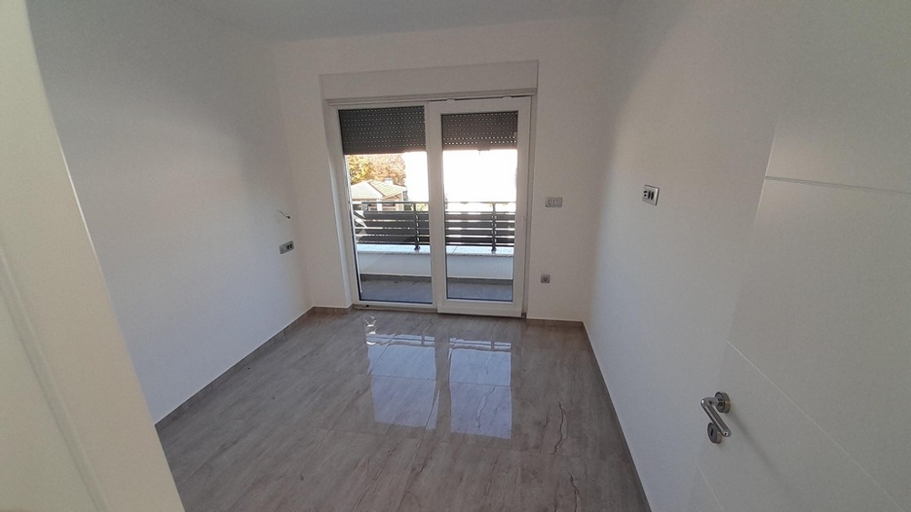 Sypialnia z wyjściem na balkon