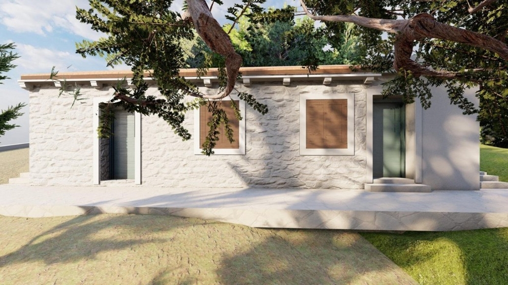 Zmodernizowany kamienny dom ze śródziemnomorską fasadą i tarasem